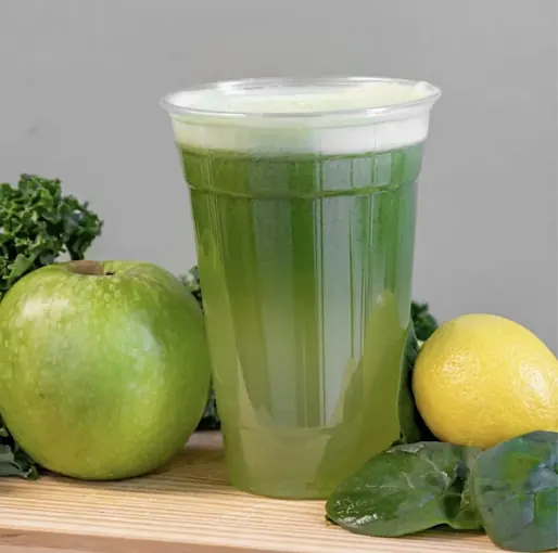 Fresh green juice with apple, lemon, kale and spinach