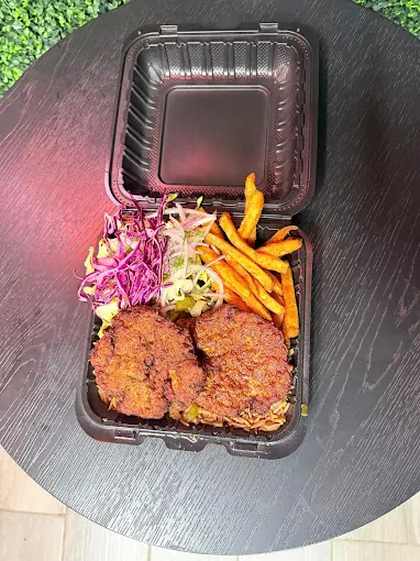 Kebab box with rice, seasoned fries, slaw and onions