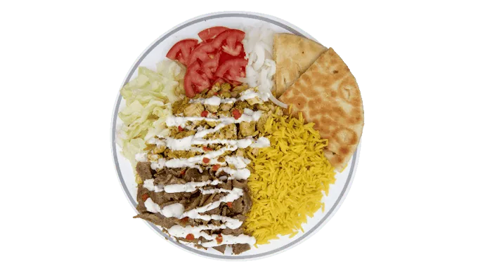 Combo platter with gyro, chicken, yellow rice, salad, pita and white sauce